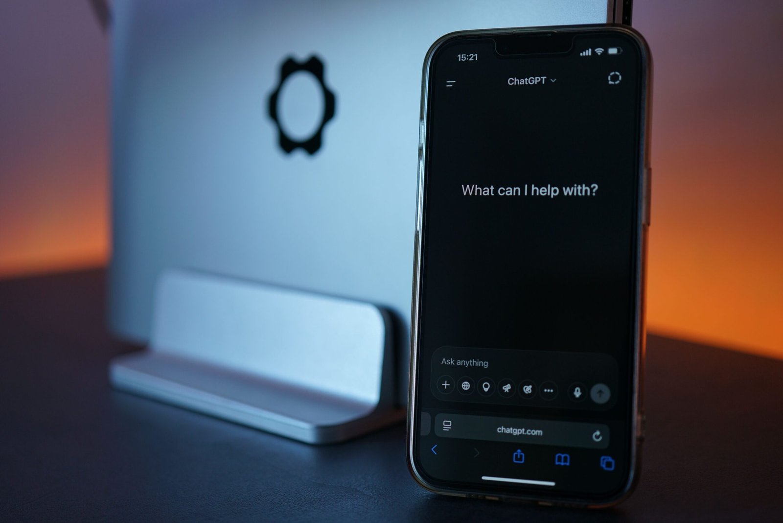 https://www.pexels.com/photo/smartphone-displaying-chat-interface-with-laptop-32021561/